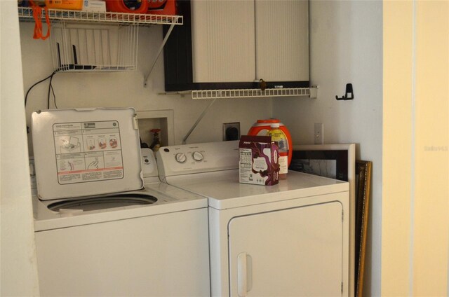 3800 SW 20th Ave Unit 405, Gainesville, FL 32607 - laundry area with washer and clothes dryer