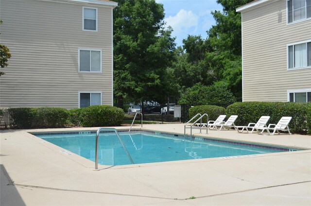 3800 SW 20th Ave Unit 405, Gainesville, FL 32607 - community pool with a patio