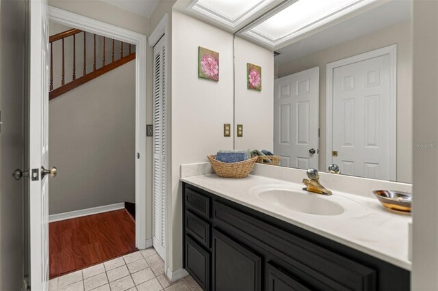5328 NW 9th Ln, Gainesville, FL 32605 - bathroom featuring vanity, tile patterned floors, and baseboards