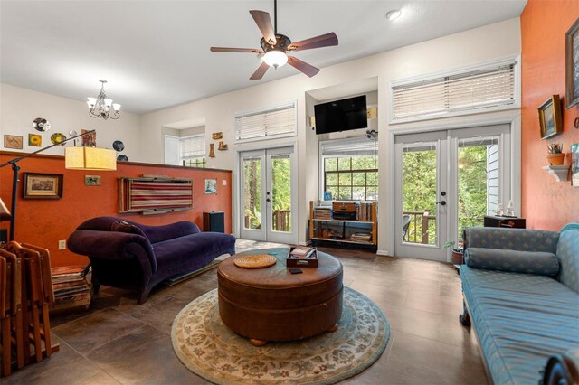 5328 NW 9th Ln, Gainesville, FL 32605 - living area featuring french doors, plenty of natural light, a chandelier, and ceiling fan