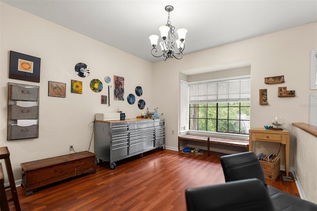 5328 NW 9th Ln, Gainesville, FL 32605 - sitting room with dark wood-type flooring, a chandelier, and baseboards