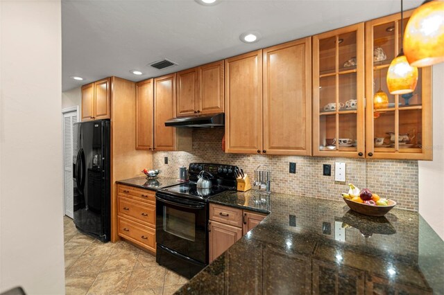 5328 NW 9th Ln, Gainesville, FL 32605 - kitchen with black appliances, under cabinet range hood, dark stone counters, backsplash, and recessed lighting