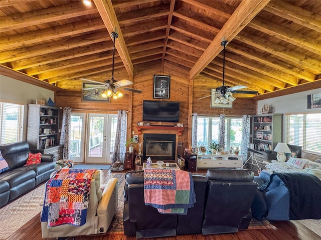131 Ida Blvd, Interlachen, FL 32148 - living area with a ceiling fan, wooden ceiling, wood finished floors, plenty of natural light, and wooden walls