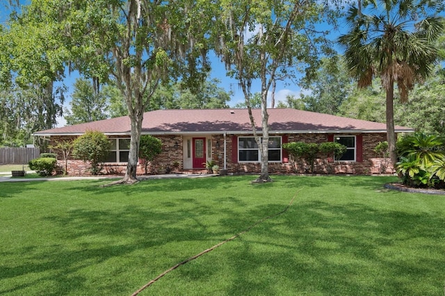 2626 NW 36th Pl, Gainesville, FL 32605 - single story home with brick siding