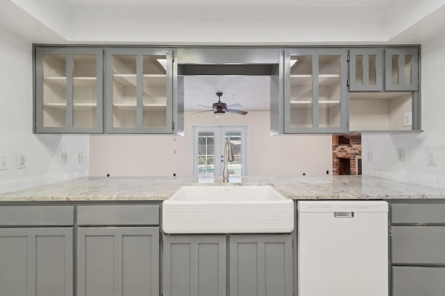 2626 NW 36th Pl, Gainesville, FL 32605 - kitchen with gray cabinetry and white dishwasher