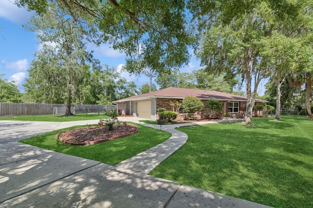 2626 NW 36th Pl, Gainesville, FL 32605 - ranch-style house featuring concrete driveway, an attached garage, and brick siding