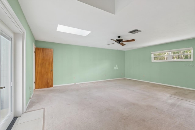 2626 NW 36th Pl, Gainesville, FL 32605 - carpeted spare room featuring a skylight and ceiling fan