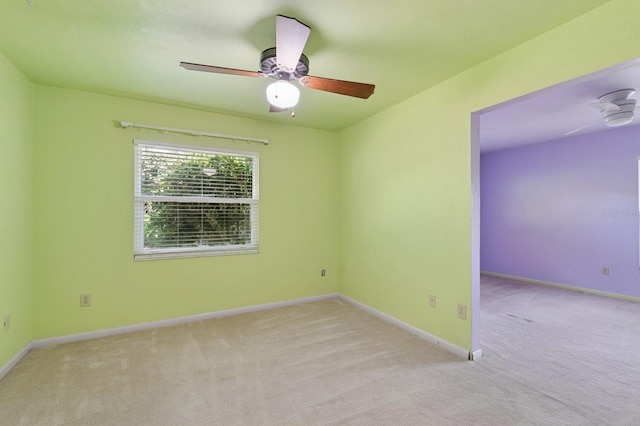 2626 NW 36th Pl, Gainesville, FL 32605 - unfurnished room featuring carpet and a ceiling fan