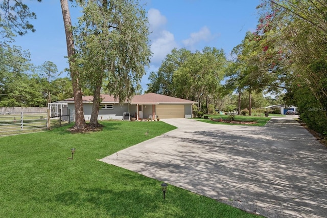 2626 NW 36th Pl, Gainesville, FL 32605 - single story home featuring driveway and an attached garage