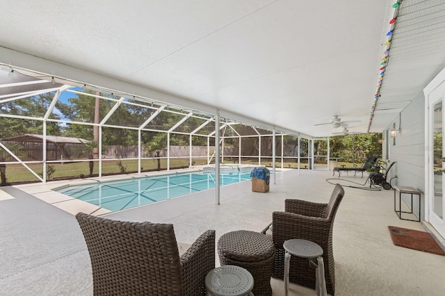 2626 NW 36th Pl, Gainesville, FL 32605 - view of swimming pool featuring a fenced backyard, a patio, a lanai, and ceiling fan
