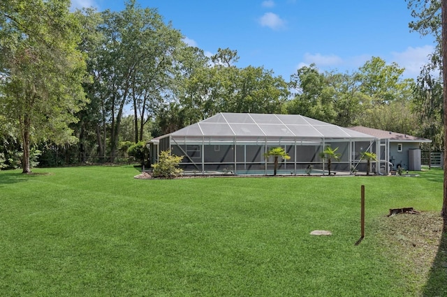 2626 NW 36th Pl, Gainesville, FL 32605 - view of green lawn featuring an outdoor pool and glass enclosure