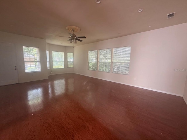 9405 SW 31st Ln, Gainesville, FL 32608 - spare room with wood finished floors and a ceiling fan