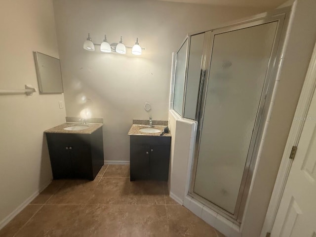 9405 SW 31st Ln, Gainesville, FL 32608 - full bathroom with vanity, a stall shower, and tile patterned flooring