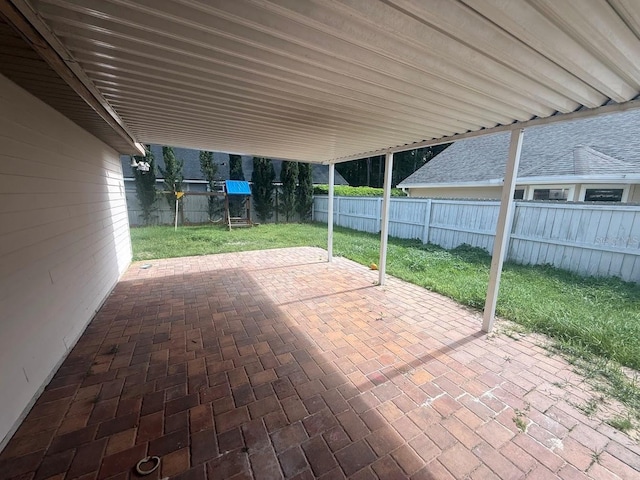 9405 SW 31st Ln, Gainesville, FL 32608 - fenced backyard with a patio
