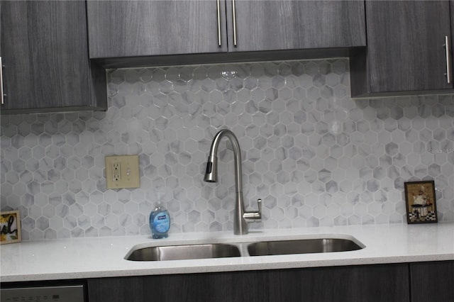 1700 SW 16th Ct Unit E30, Gainesville, FL 32608 - kitchen with tasteful backsplash, modern cabinets, stainless steel dishwasher, and dark brown cabinetry