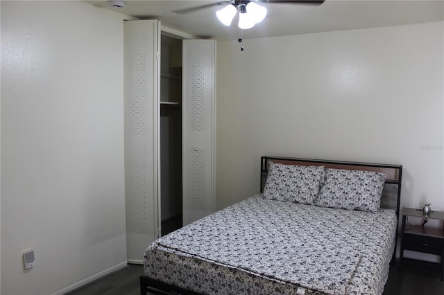 1700 SW 16th Ct Unit E30, Gainesville, FL 32608 - bedroom with a ceiling fan and baseboards