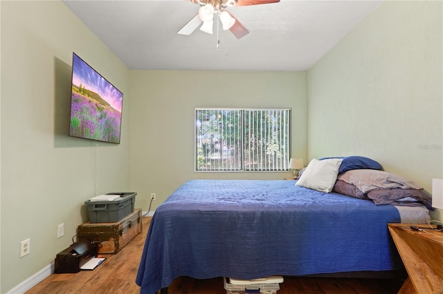 3958 NW 27th Ln, Gainesville, FL 32606 - bedroom featuring wood finished floors and a ceiling fan