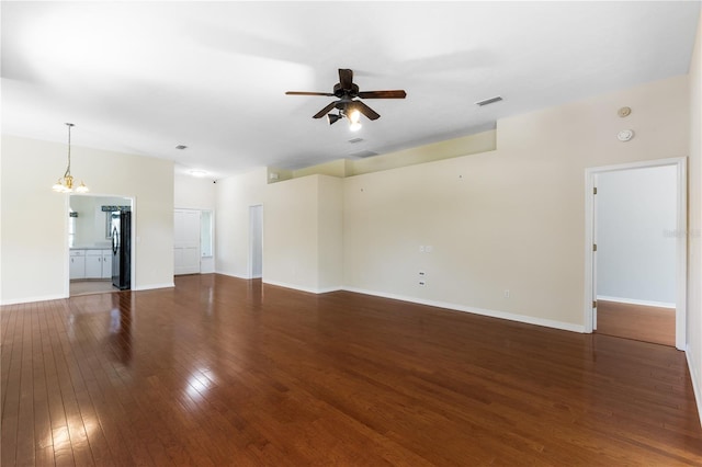 6033 NW 36th Dr, Gainesville, FL 32653 - unfurnished living room with a ceiling fan and hardwood / wood-style flooring