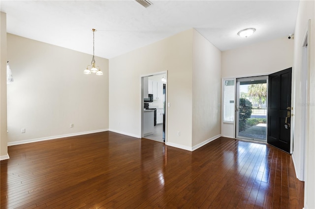 6033 NW 36th Dr, Gainesville, FL 32653 - entrance foyer with a chandelier and wood-type flooring