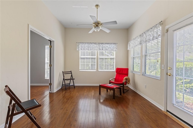 6033 NW 36th Dr, Gainesville, FL 32653 - living area featuring healthy amount of natural light, hardwood / wood-style flooring, and ceiling fan