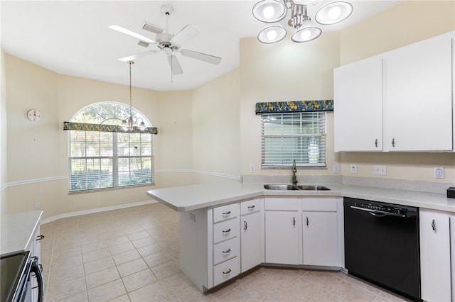 6033 NW 36th Dr, Gainesville, FL 32653 - kitchen with dishwasher, a chandelier, a peninsula, and light countertops