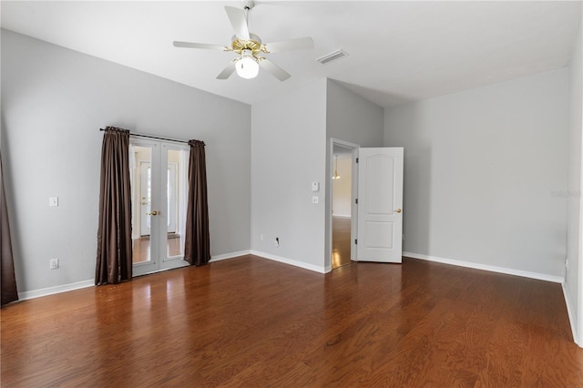 6033 NW 36th Dr, Gainesville, FL 32653 - spare room with french doors, wood finished floors, and a ceiling fan