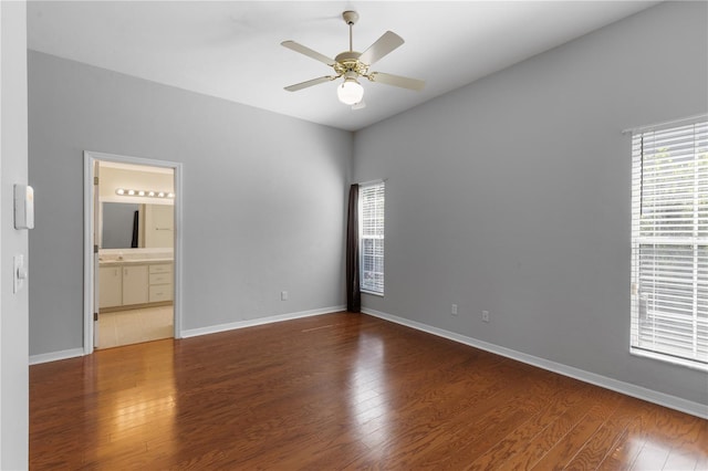 6033 NW 36th Dr, Gainesville, FL 32653 - empty room featuring a ceiling fan and wood finished floors