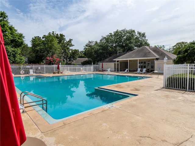 6033 NW 36th Dr, Gainesville, FL 32653 - community pool featuring a patio area