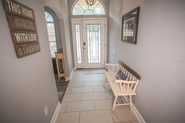 2361 Sandy Run Dr N, Middleburg, FL 32068 - tiled foyer entrance with baseboards and arched walkways