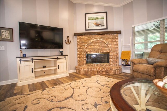 2361 Sandy Run Dr N, Middleburg, FL 32068 - living room featuring wood finished floors, crown molding, and a brick fireplace