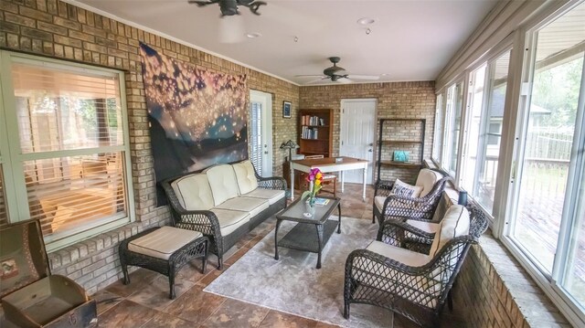 2361 Sandy Run Dr N, Middleburg, FL 32068 - sunroom with brick wall, a ceiling fan, outdoor lounge area, and crown molding