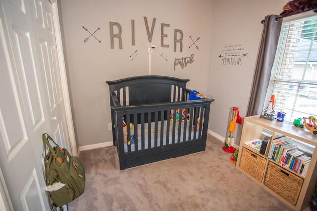 2361 Sandy Run Dr N, Middleburg, FL 32068 - bedroom featuring carpet and a crib