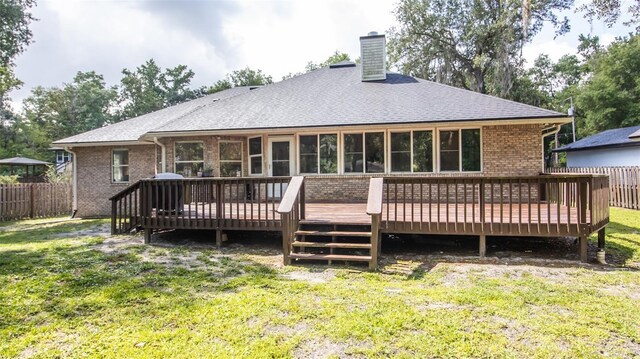 2361 Sandy Run Dr N, Middleburg, FL 32068 - rear view of property featuring a chimney, brick siding, roof with shingles, and a deck