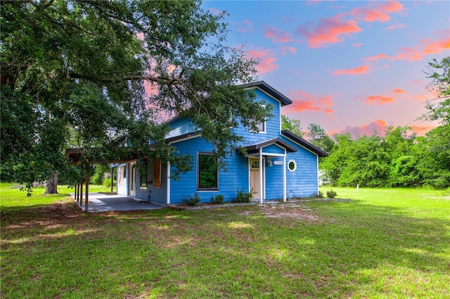 14727 SW 92nd St, Lake Butler, FL 32054 - view of front facade with a front yard and a patio