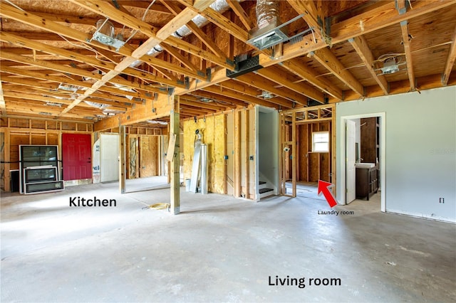 14727 SW 92nd St, Lake Butler, FL 32054 - misc room with unfinished concrete flooring and stairs