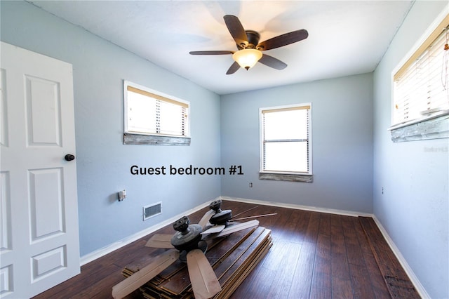 14727 SW 92nd St, Lake Butler, FL 32054 - exercise room with plenty of natural light, ceiling fan, and dark wood-style flooring