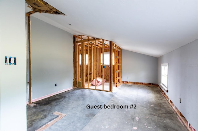 14727 SW 92nd St, Lake Butler, FL 32054 - spare room featuring plenty of natural light and lofted ceiling