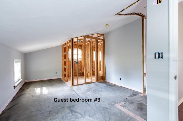 14727 SW 92nd St, Lake Butler, FL 32054 - spare room featuring plenty of natural light and lofted ceiling