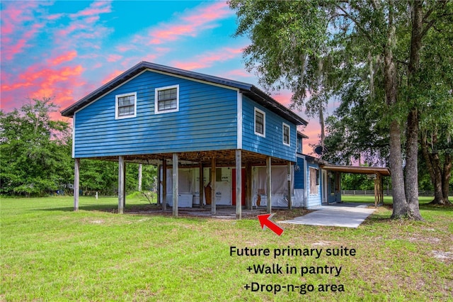 14727 SW 92nd St, Lake Butler, FL 32054 - view of front of house featuring a lawn and a patio