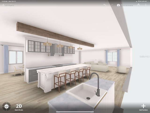 14727 SW 92nd St, Lake Butler, FL 32054 - kitchen with healthy amount of natural light, light wood finished floors, beamed ceiling, and a kitchen island