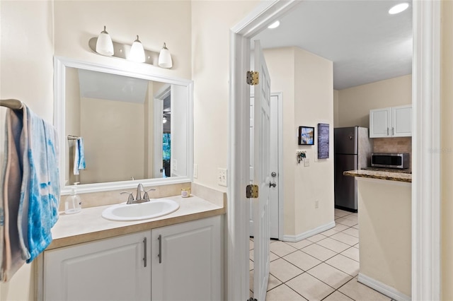 13200 W Newberry Rd Unit T110, Newberry, FL 32669 - bathroom with tile patterned floors and vanity