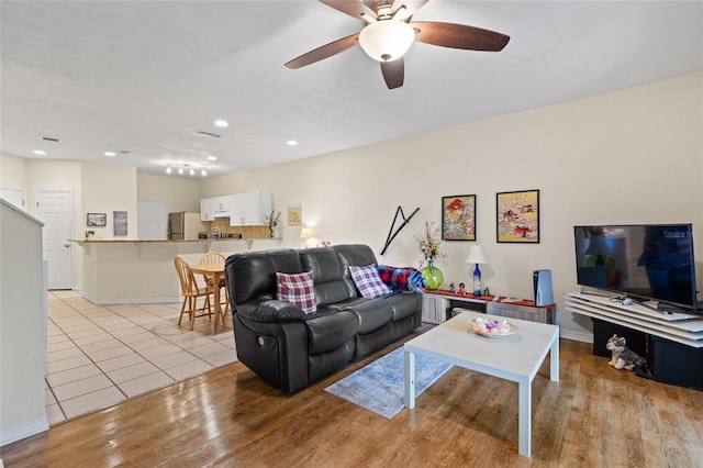 13200 W Newberry Rd Unit T110, Newberry, FL 32669 - living area with a ceiling fan, light wood-style flooring, and recessed lighting