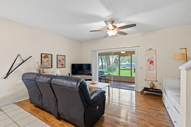 13200 W Newberry Rd Unit T110, Newberry, FL 32669 - living area with ceiling fan and wood finished floors