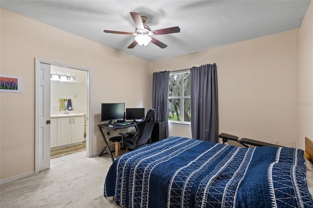 13200 W Newberry Rd Unit T110, Newberry, FL 32669 - bedroom featuring light carpet, ceiling fan, and ensuite bathroom
