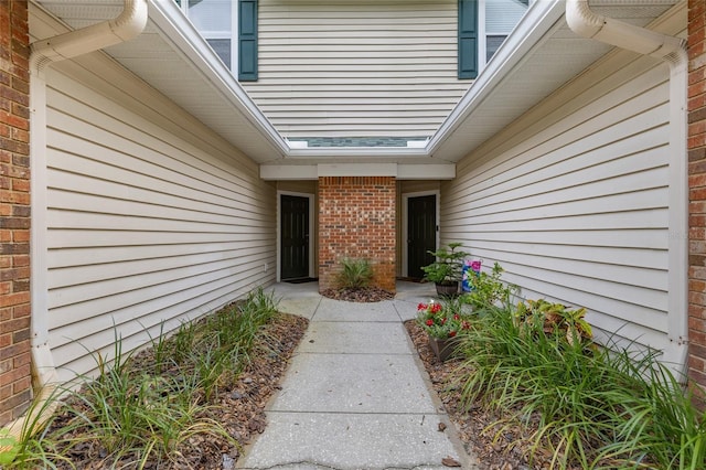 13200 W Newberry Rd Unit T110, Newberry, FL 32669 - doorway to property featuring brick siding