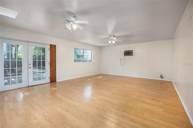 2147 NW 7th Pl, Gainesville, FL 32603 - unfurnished room with french doors, a ceiling fan, wood finished floors, and ornamental molding
