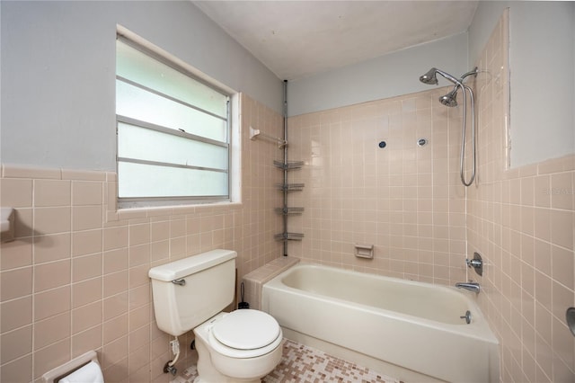 2147 NW 7th Pl, Gainesville, FL 32603 - bathroom featuring tile walls and shower / tub combination