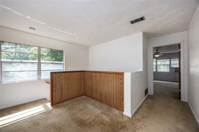 2147 NW 7th Pl, Gainesville, FL 32603 - empty room featuring light colored carpet and baseboards