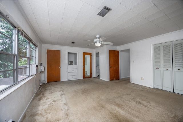2147 NW 7th Pl, Gainesville, FL 32603 - unfurnished bedroom with carpet and a ceiling fan