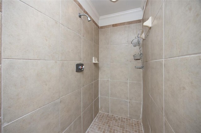 2147 NW 7th Pl, Gainesville, FL 32603 - full bathroom featuring ornamental molding and a tile shower